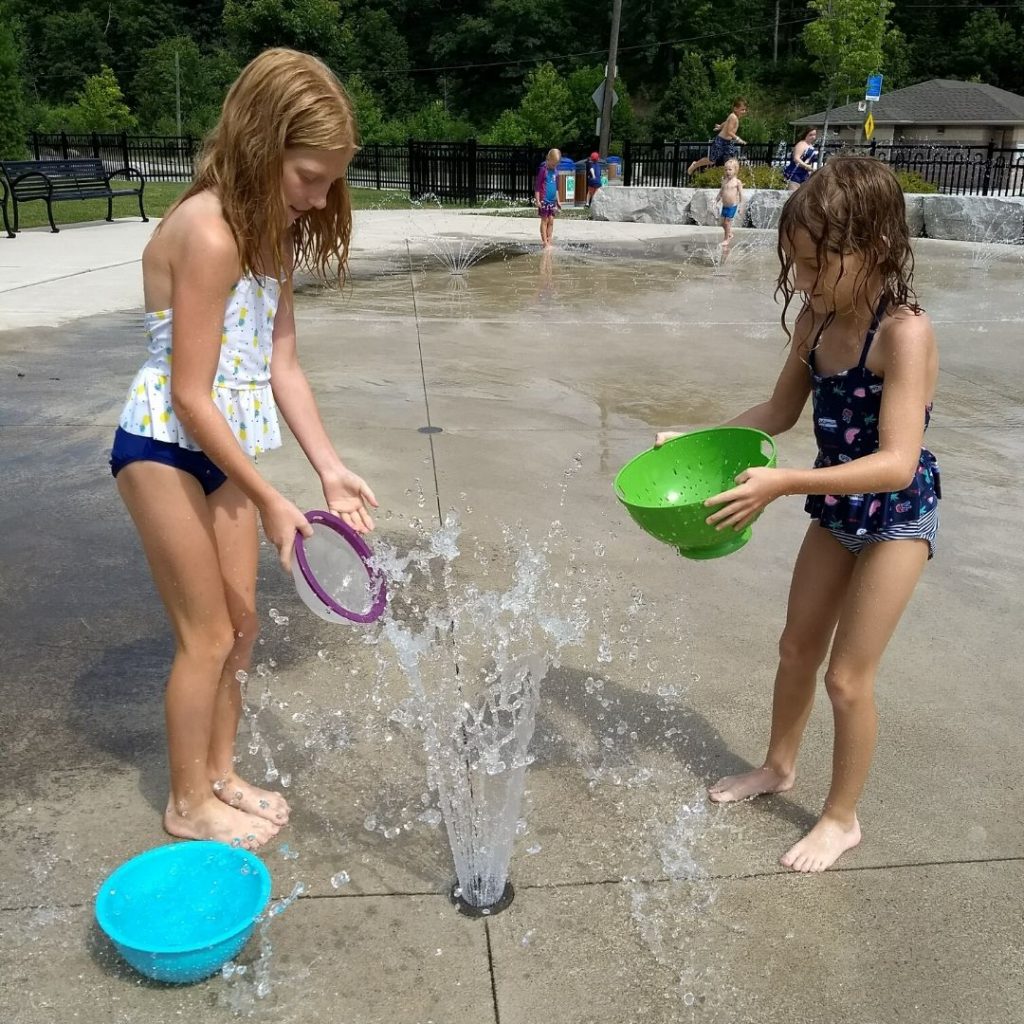 Splashing at Hidden Valley Park in Burlington