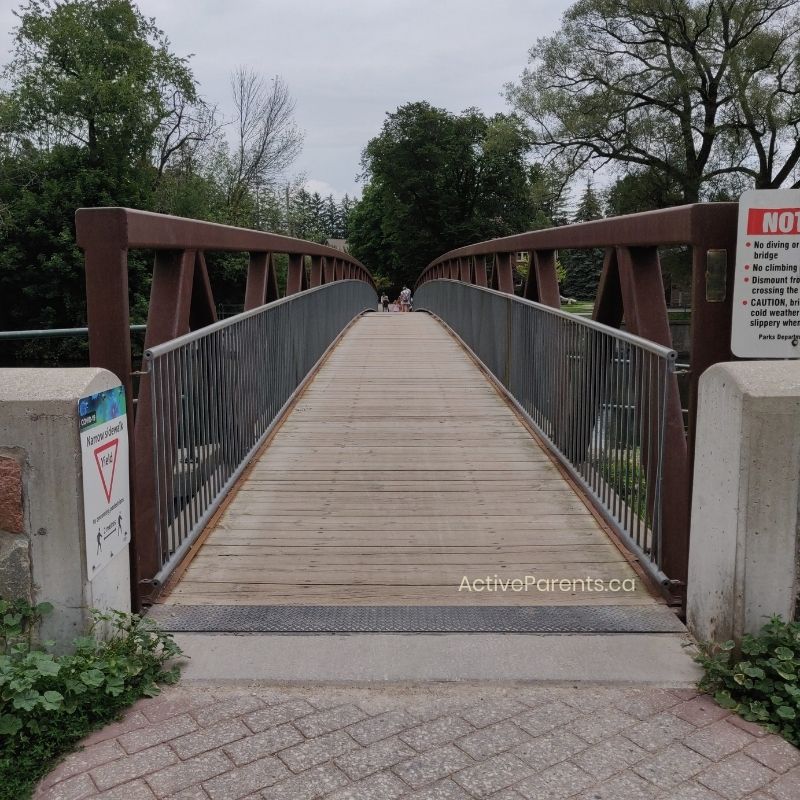 A view of the pedestrian bridge at riverside park over the speed river