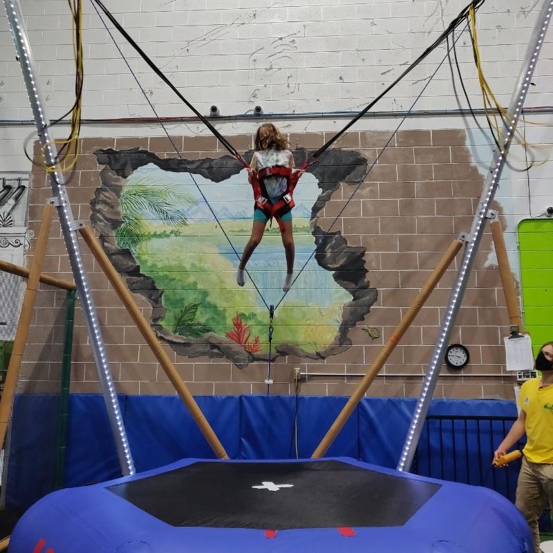 bungee trampoline in action at lil monkeys burlington playground