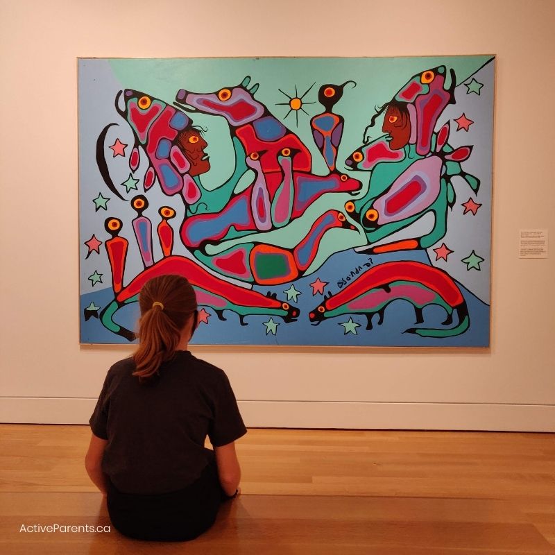 Young girl looking at Indigenous art at the art gallery of hamilton