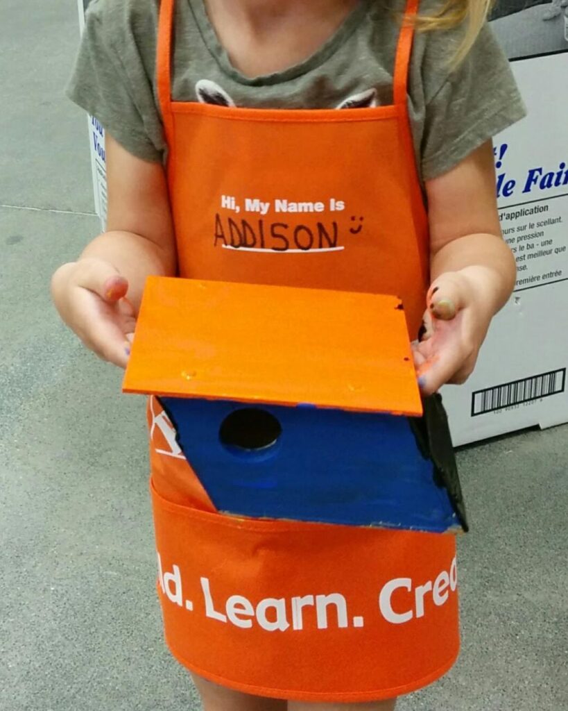 making a birdhouse at a Home Depot Kids Workshop